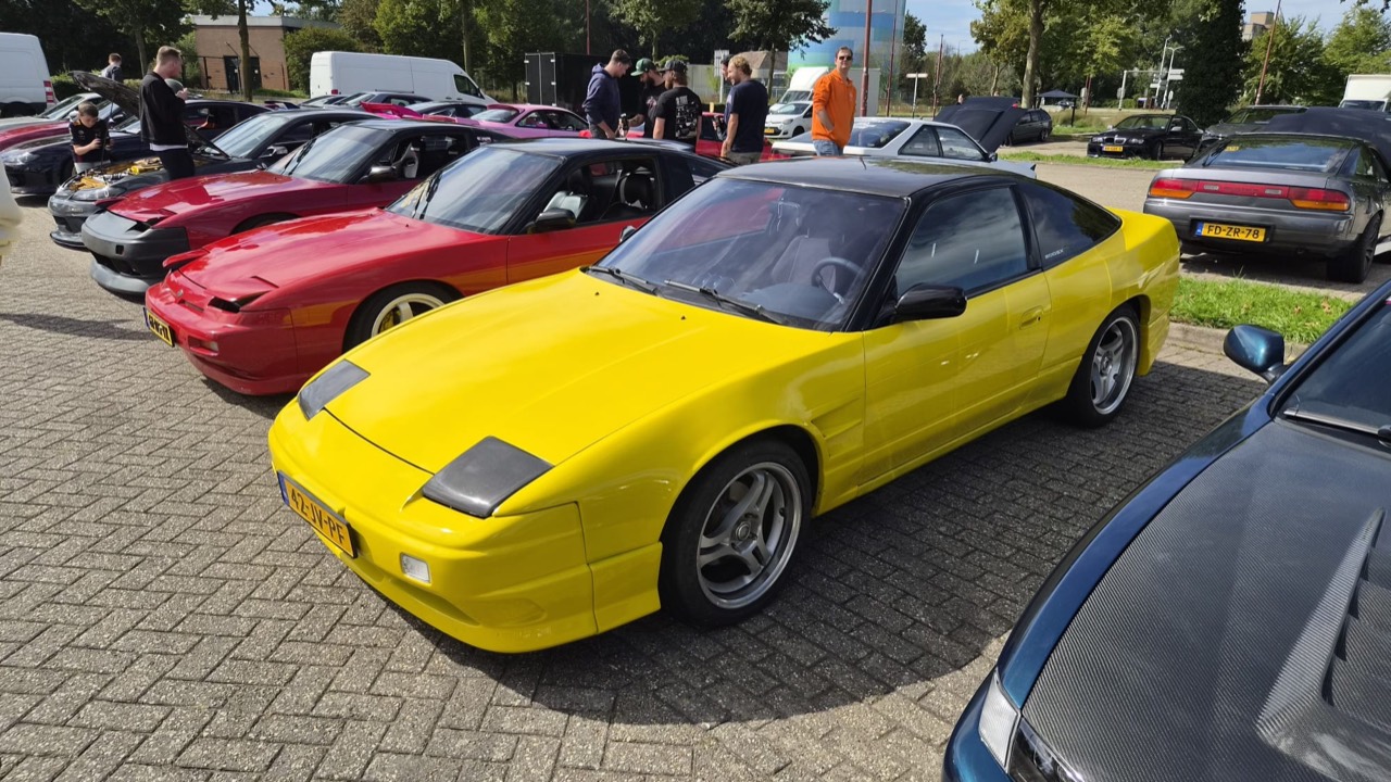 Traffic Yellow Nissan 200SX S13 at its first car meeting