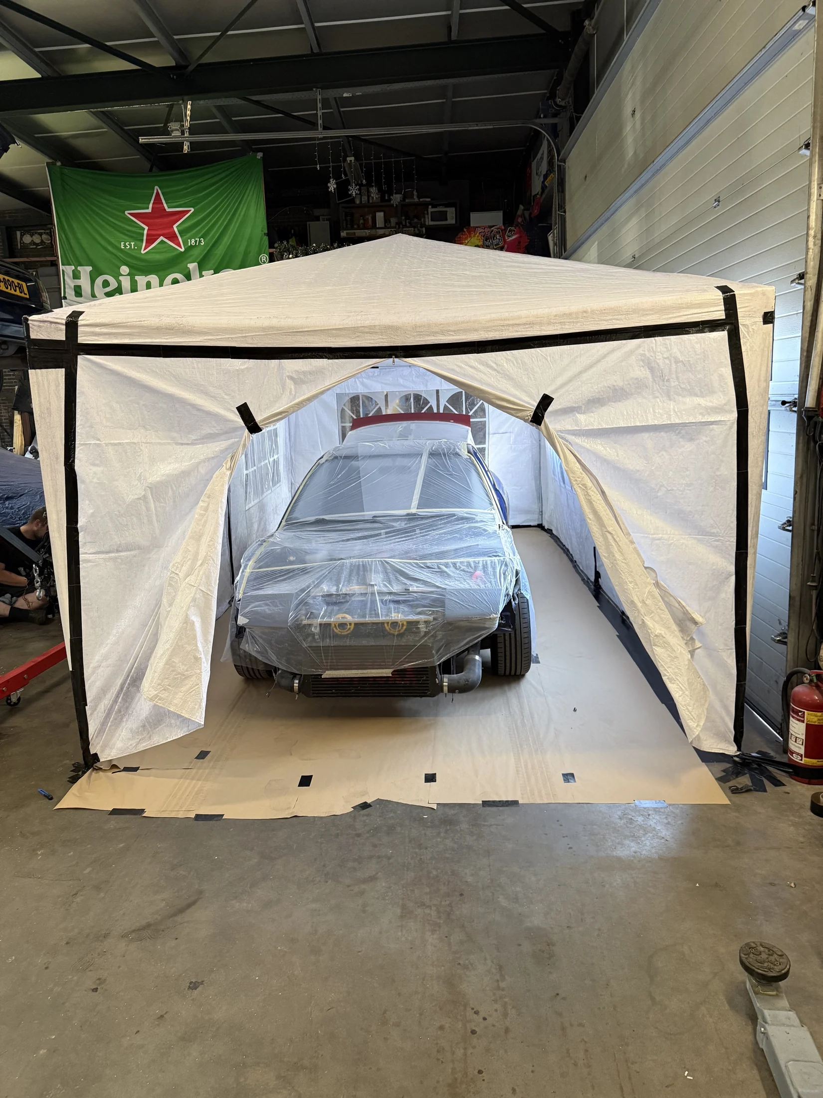 S13 fully masked inside an improvised paint booth
