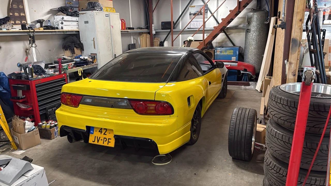 Traffic Yellow S13 with the doors and rear bumper fitted